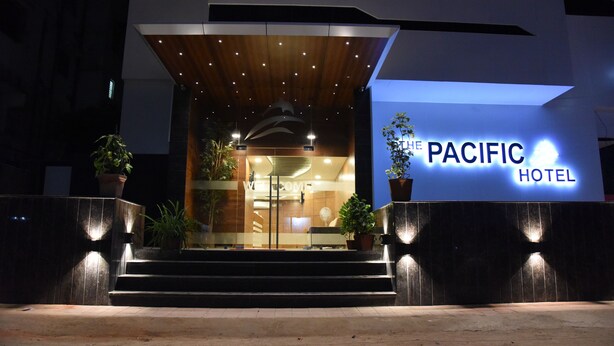 The Pacific Hotel entrance with a modern design, featuring a welcoming sign and a staircase leading to the lobby. - The Pacific Hotel, Vadodara (Vadodara)