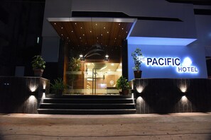 The Pacific Hotel entrance with a modern design, featuring a welcoming sign and a staircase leading to the lobby. - The Pacific Hotel, Vadodara (Vadodara)