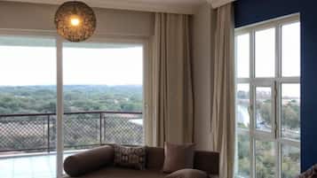 Comfort Apartment | Living room | 102-inch flat-screen TV with satellite channels, LCD TV