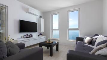 Exclusive Apartment, Sea View | Living area | LCD TV