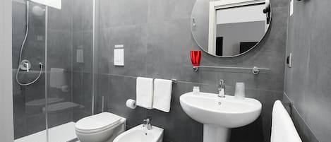 Deluxe Room, 1 Queen Bed, City View | Bathroom | Shower, rainfall showerhead, free toiletries, hair dryer