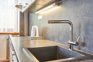 Apartamento, vistas a la ciudad (2) | Cocina básica privada | Frigorífico