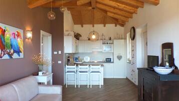 House, 1 Bedroom | Ruang tamu | 40 inci televisyen skrin rata dengan digital, TV