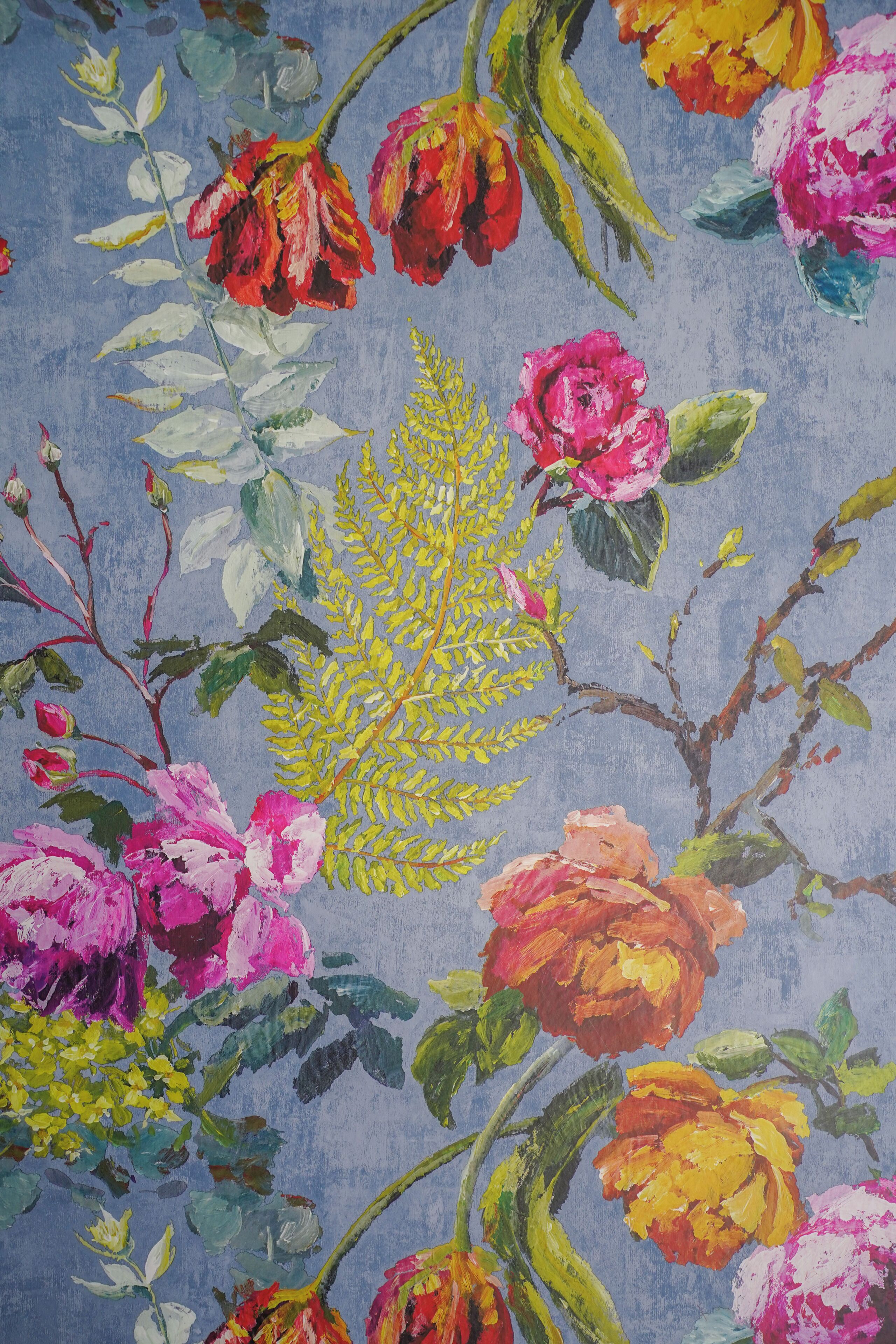 A floral pattern with various flowers and leaves.