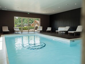 Indoor pool, open 7:00 AM to 9:00 PM, free cabanas, sun loungers