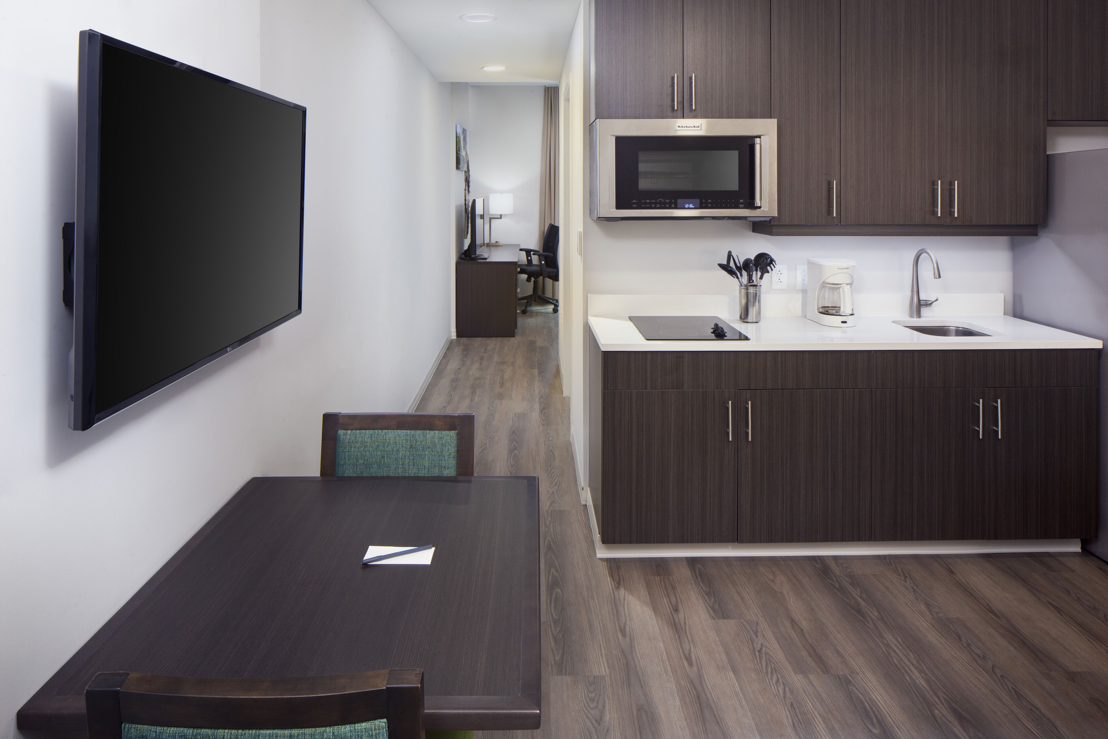 comfort suite, 1 king bed with sofa bed | private kitchen | full-sized fridge, microwave, stovetop, cookware/dishes/utensils