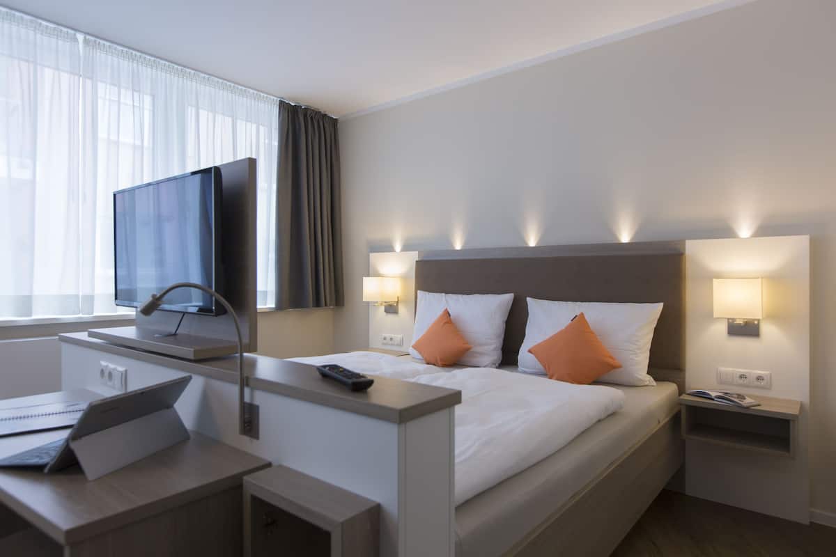 Desk, blackout drapes, soundproofing, cribs (surcharge)