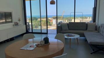 Apartment, 1 Bedroom, Ocean View (503) | Living area | Smart TV