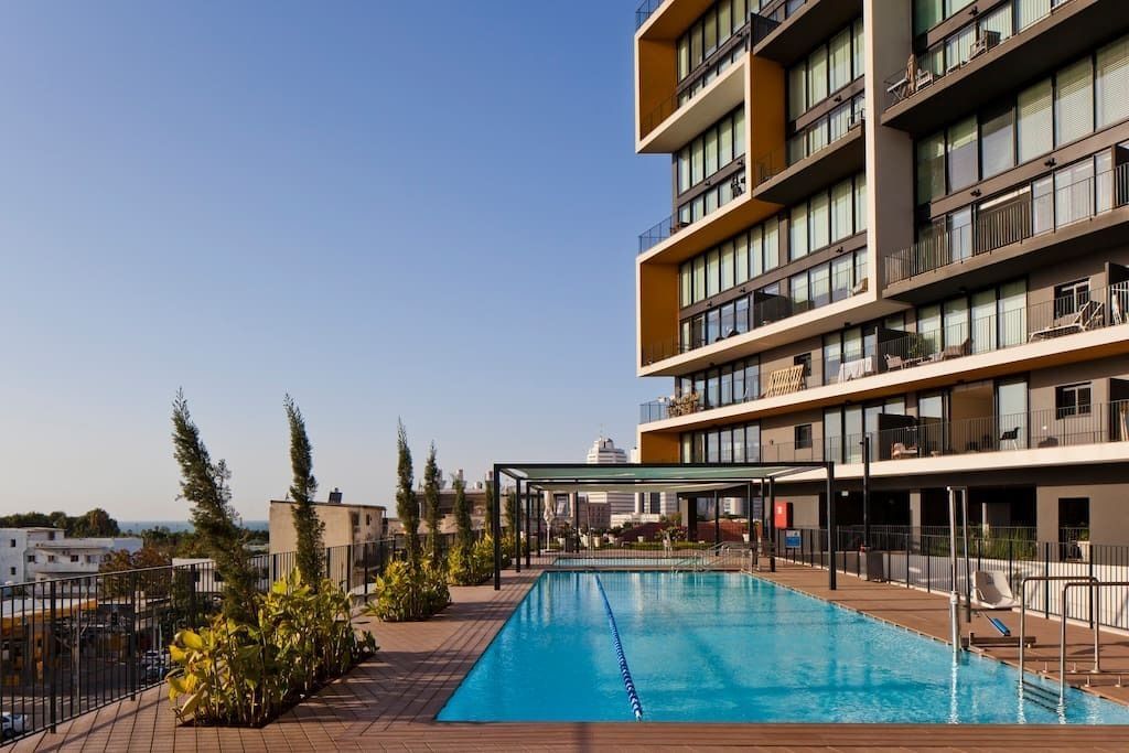 Seasonal outdoor pool, pool umbrellas, pool loungers