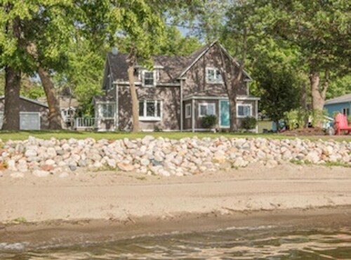 Steps away to Lake, deck w/ lake views, dock or fishing & swimming, fire pit!