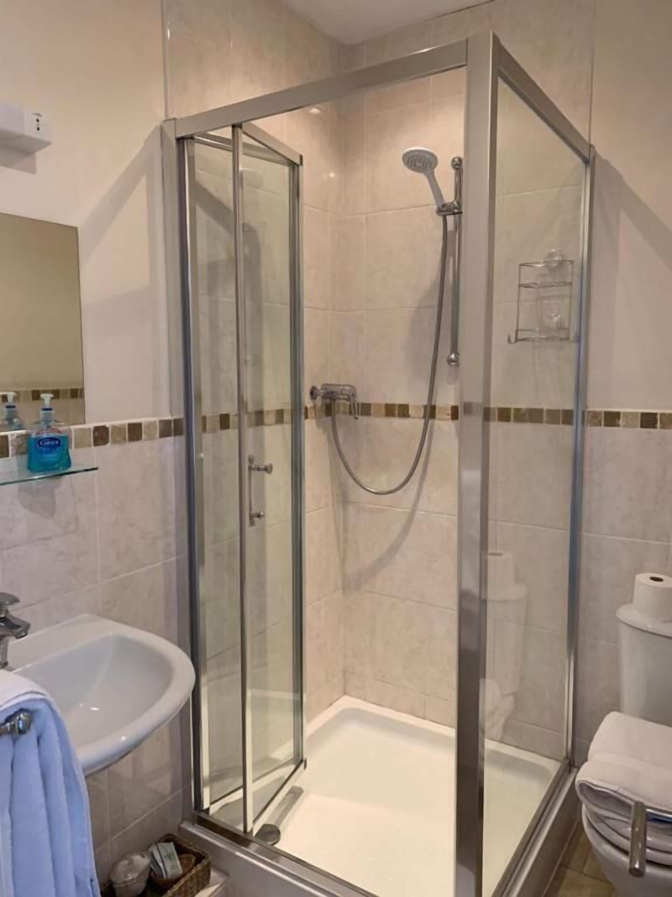 Shower, free toiletries, hair dryer, towels