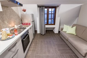 Rom – standard | Oppholdsområde | Flatskjerm-TV