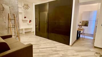 Superior Suite | Living area | Flat-screen TV