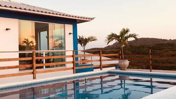 Outdoor pool, pool umbrellas, pool loungers