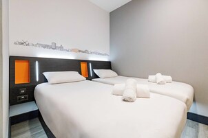 Blackout drapes, soundproofing, iron/ironing board, free WiFi