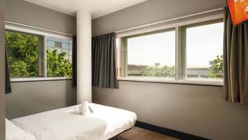 Blackout drapes, soundproofing, iron/ironing board, free WiFi
