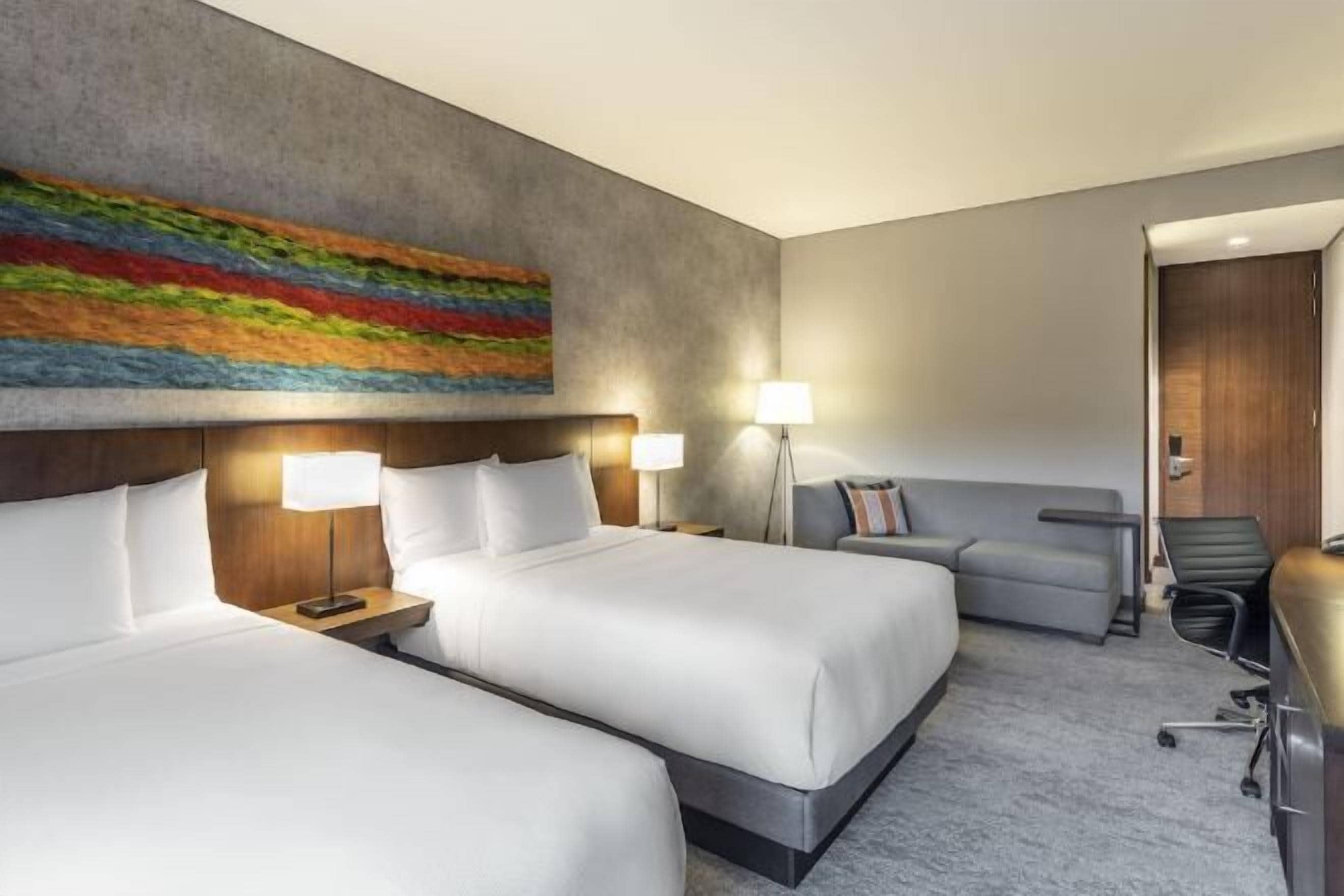 Premium bedding, down comforters, Select Comfort beds, minibar