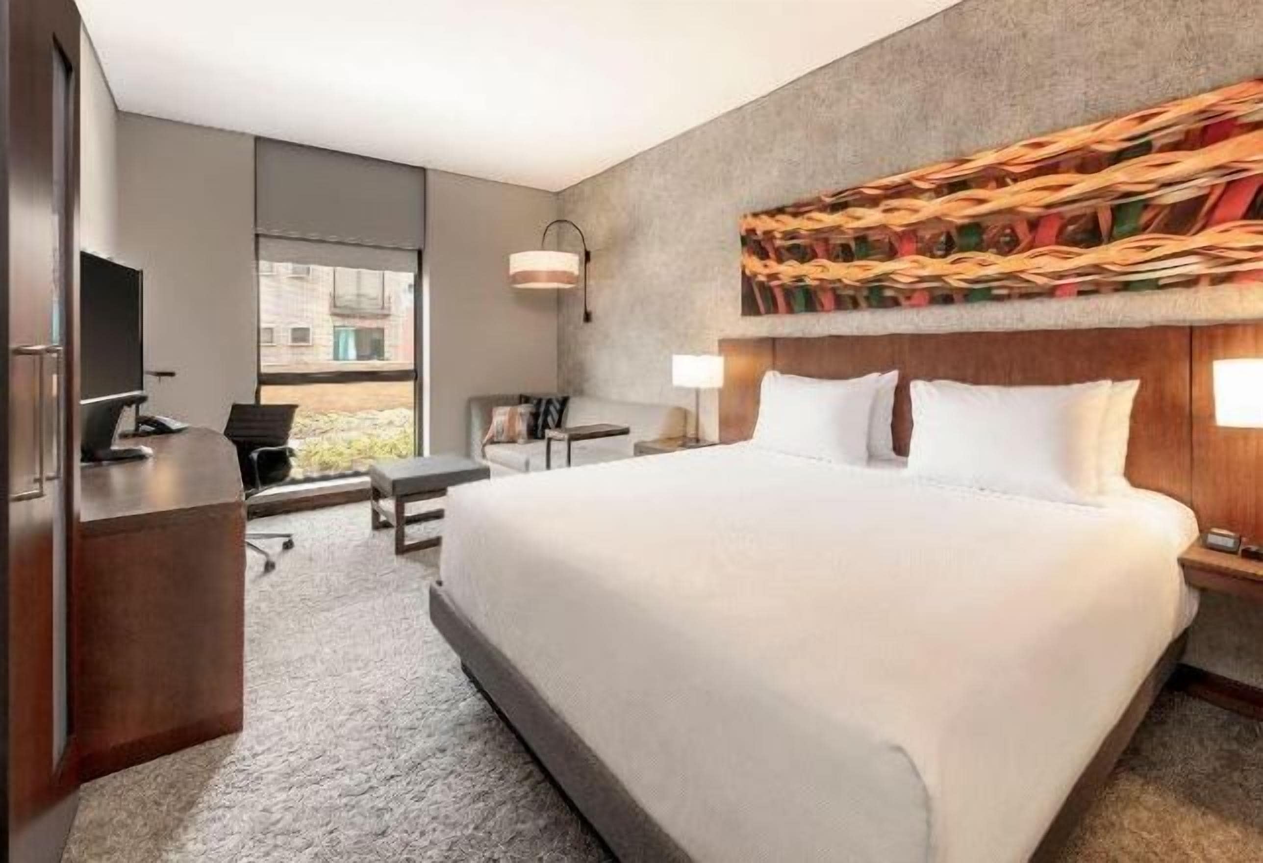 Premium bedding, down comforters, Select Comfort beds, minibar