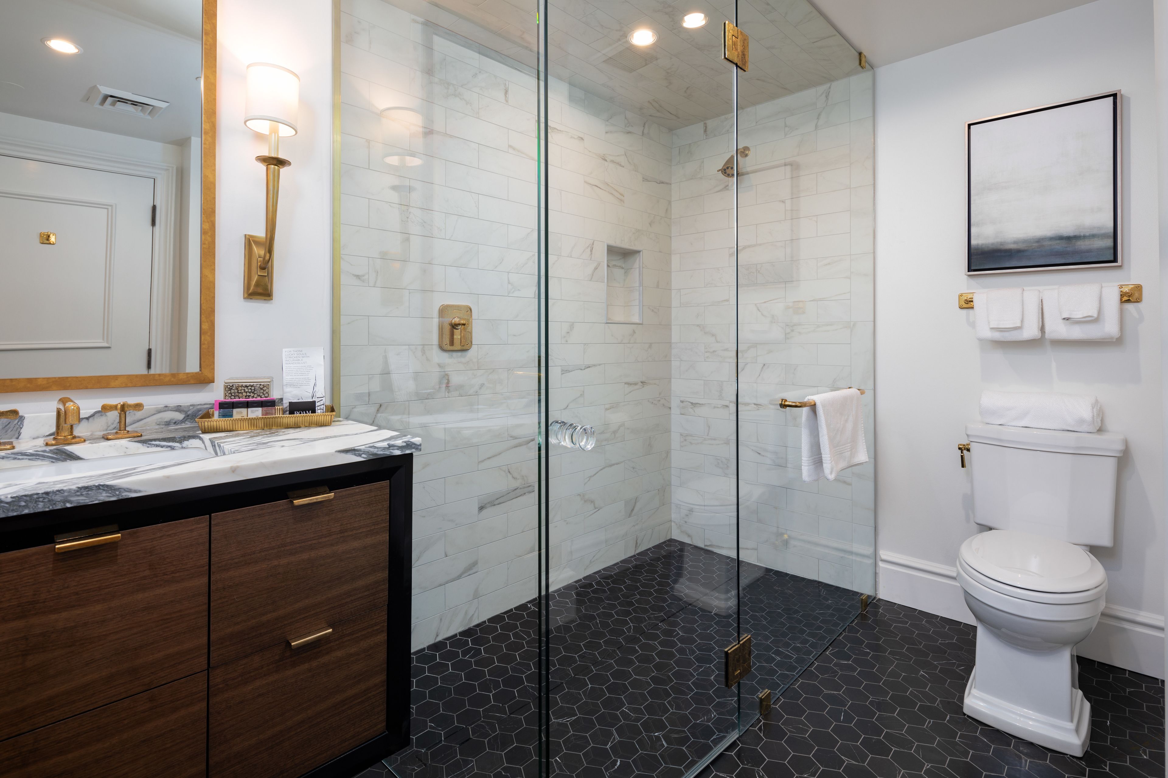premier suite, 1 king bed, city view | bathroom | shower, hair dryer, bathrobes, towels