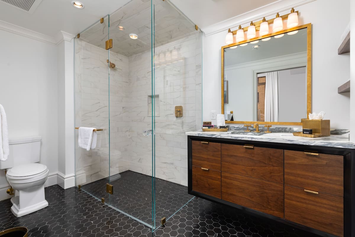 classic suite, 1 king bed, city view | bathroom | shower, hair dryer, bathrobes, towels