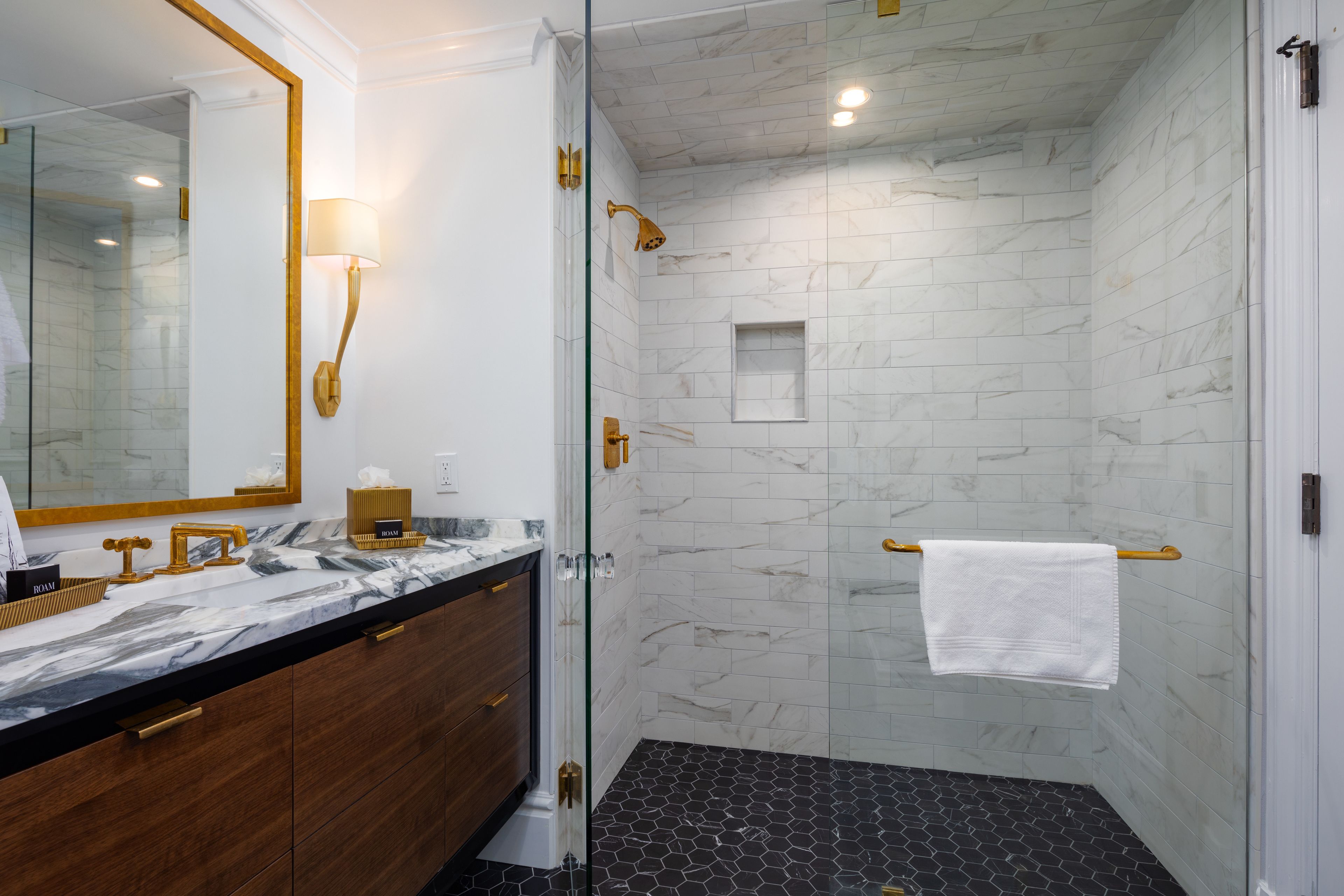 city suite, 1 king bed, city view | bathroom | shower, hair dryer, bathrobes, towels