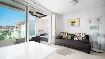 Superior Apartment, Sea View | Living area | LED TV