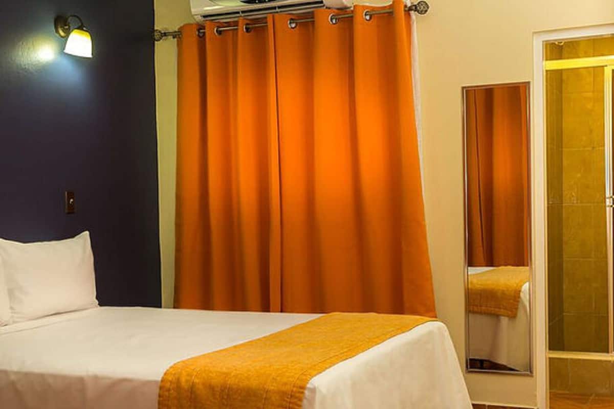 Blackout curtains, iron/ironing board, free WiFi, bed sheets