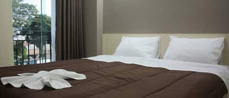 Quarto casal, 1 cama de casal | Frigobar, cortinas blackout, Wi-Fi de cortesia, roupa de cama