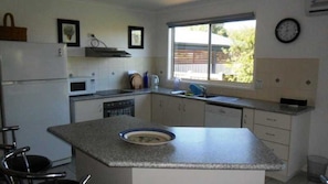 Microwave, dishwasher, cookware/dishes/utensils