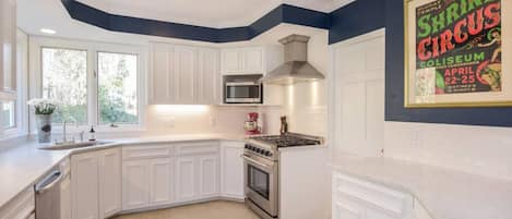Fridge, coffee/tea maker, cookware/dishes/utensils
