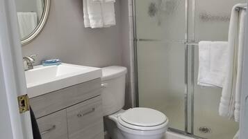 Hair dryer, towels, soap, toilet paper