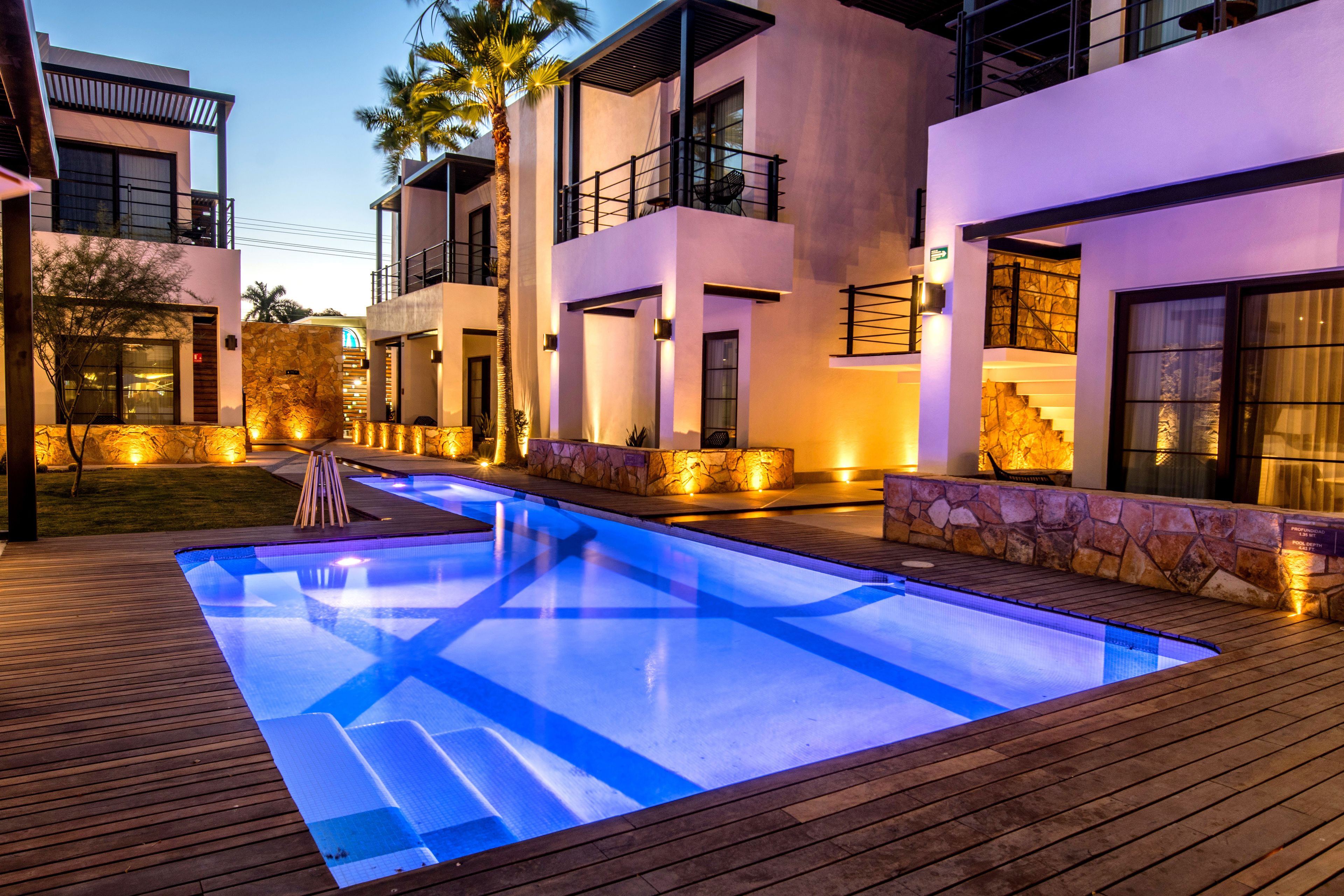 outdoor pool, open 8:00 am to 10:00 pm, pool umbrellas, pool loungers