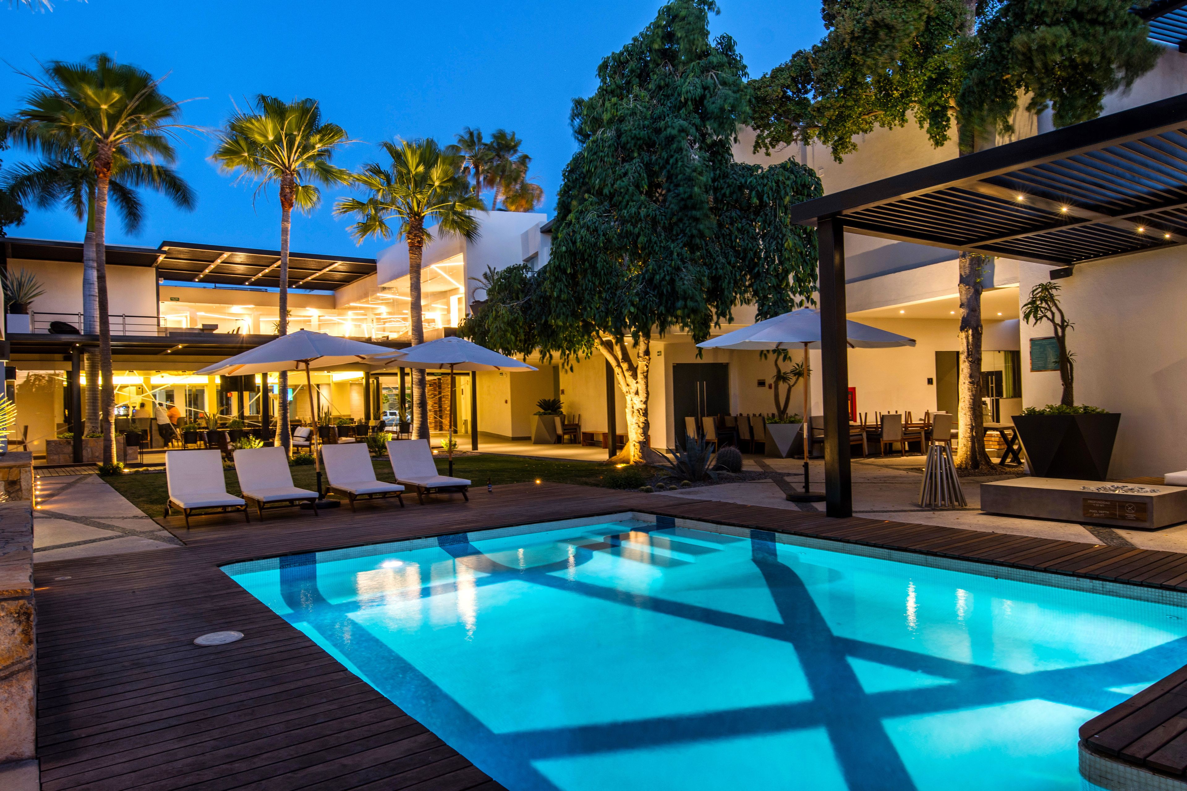 Outdoor pool, open 8:00 AM to 10:00 PM, pool umbrellas, sun loungers