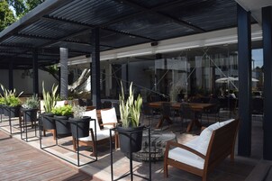 Breakfast, lunch, dinner served; local cuisine 