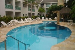 Outdoor pool, pool umbrellas, pool loungers