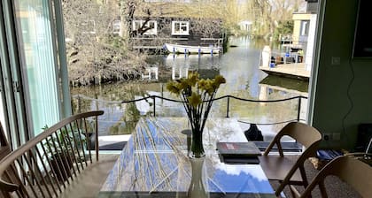 Idyllic boathouse on a private island, near Hampton Court