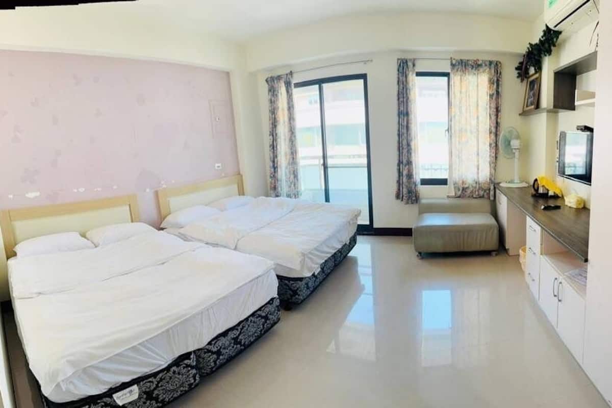 Standard Quadruple Room, Non Smoking | Desk, WiFi (free), bed sheets