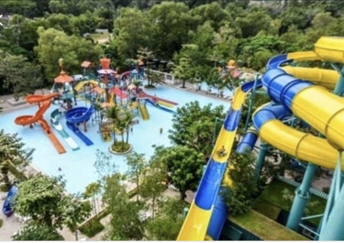 A water park with multiple slides and water features.