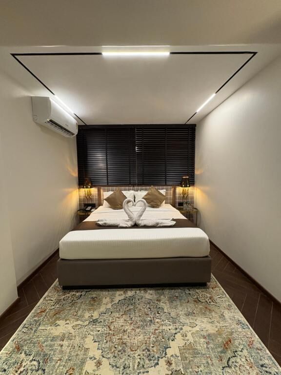 Signature Suite with Window | Frette Italian sheets, premium bedding, soundproofing