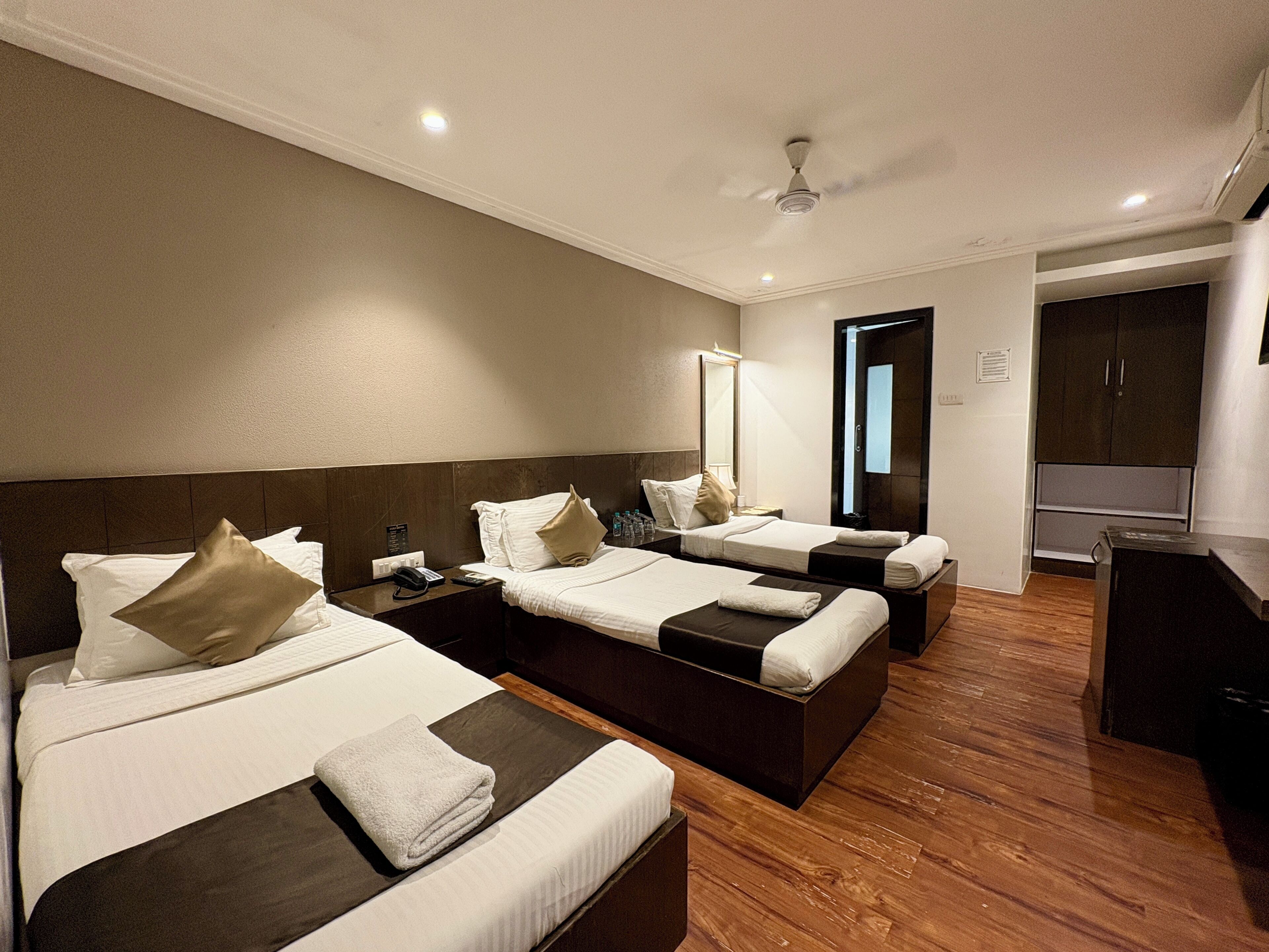 Deluxe Triple Room | Frette Italian sheets, premium bedding, soundproofing