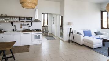 Luxury Suite, 1 Bedroom, Sea View | Living area | 32-inch flat-screen TV with digital channels, plasma TV