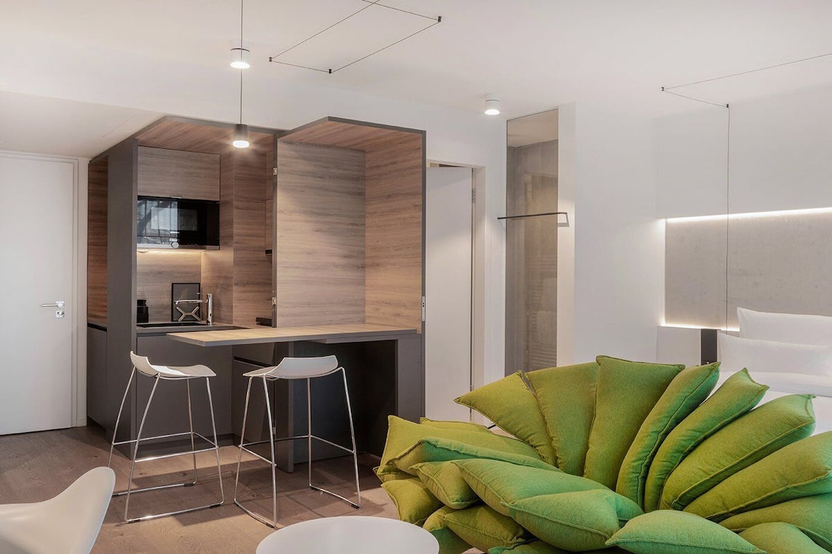 superior room, 1 king bed | living area | smart tv, tablet, netflix, table football