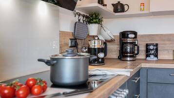 Apartment | Private kitchen | Full-sized fridge, oven, stovetop, dishwasher