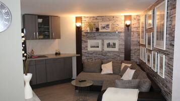 Apartment, Multiple Beds (Logis 1) | Living area | Flat-screen TV, DVD player