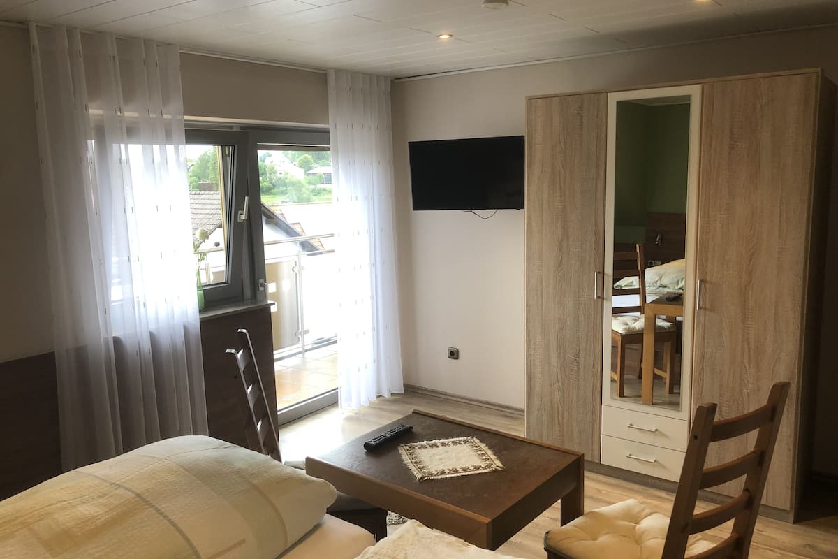 double room | living area | tv