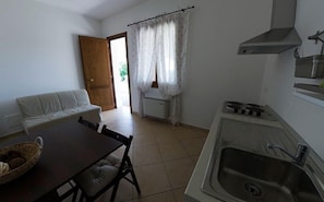 Apartamento, 1 quarto | Cozinha americana privada