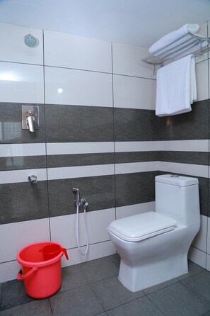 Shower, rainfall showerhead, towels
