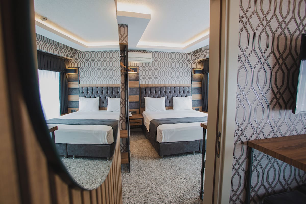 Family Room, Connecting Rooms | 1 bedroom, minibar, in-room safe, blackout drapes