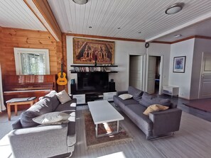 Panoramic Villa, Multiple Beds, Lake View | Living area | TV - Villa Liebelitz (Liperi)