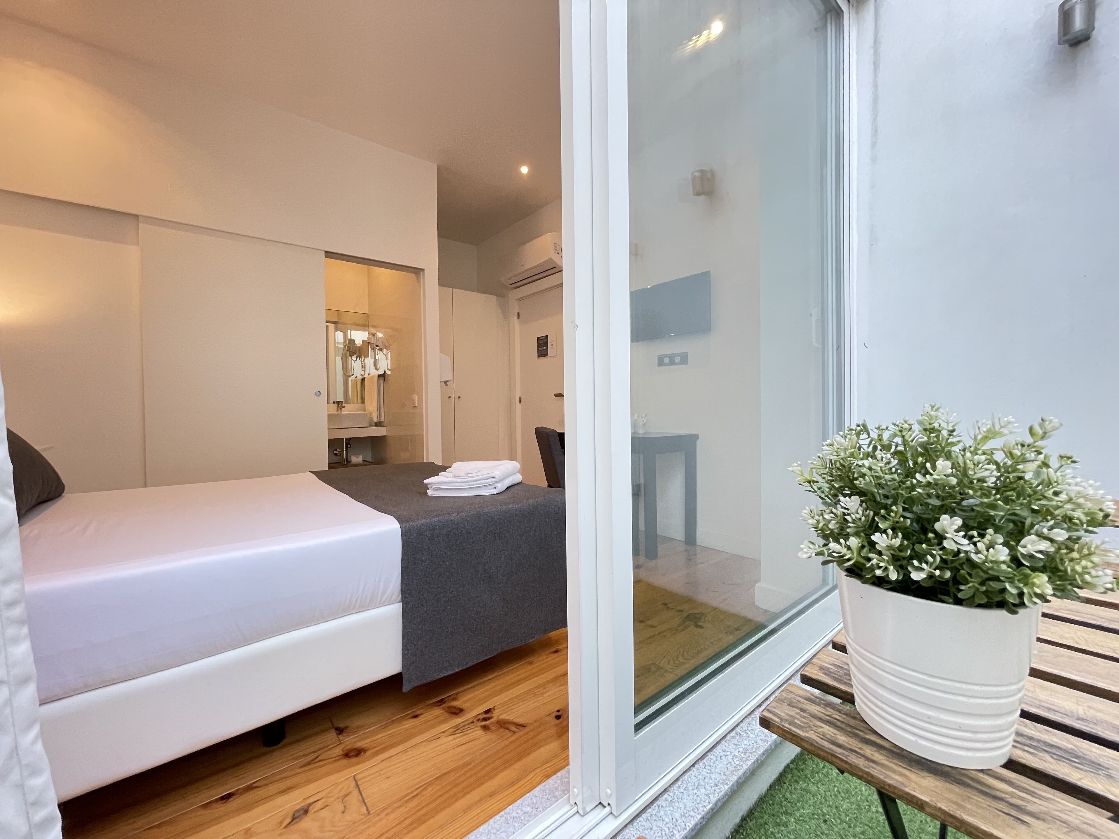 double room, terrace | individually decorated, individually furnished, desk, blackout curtains